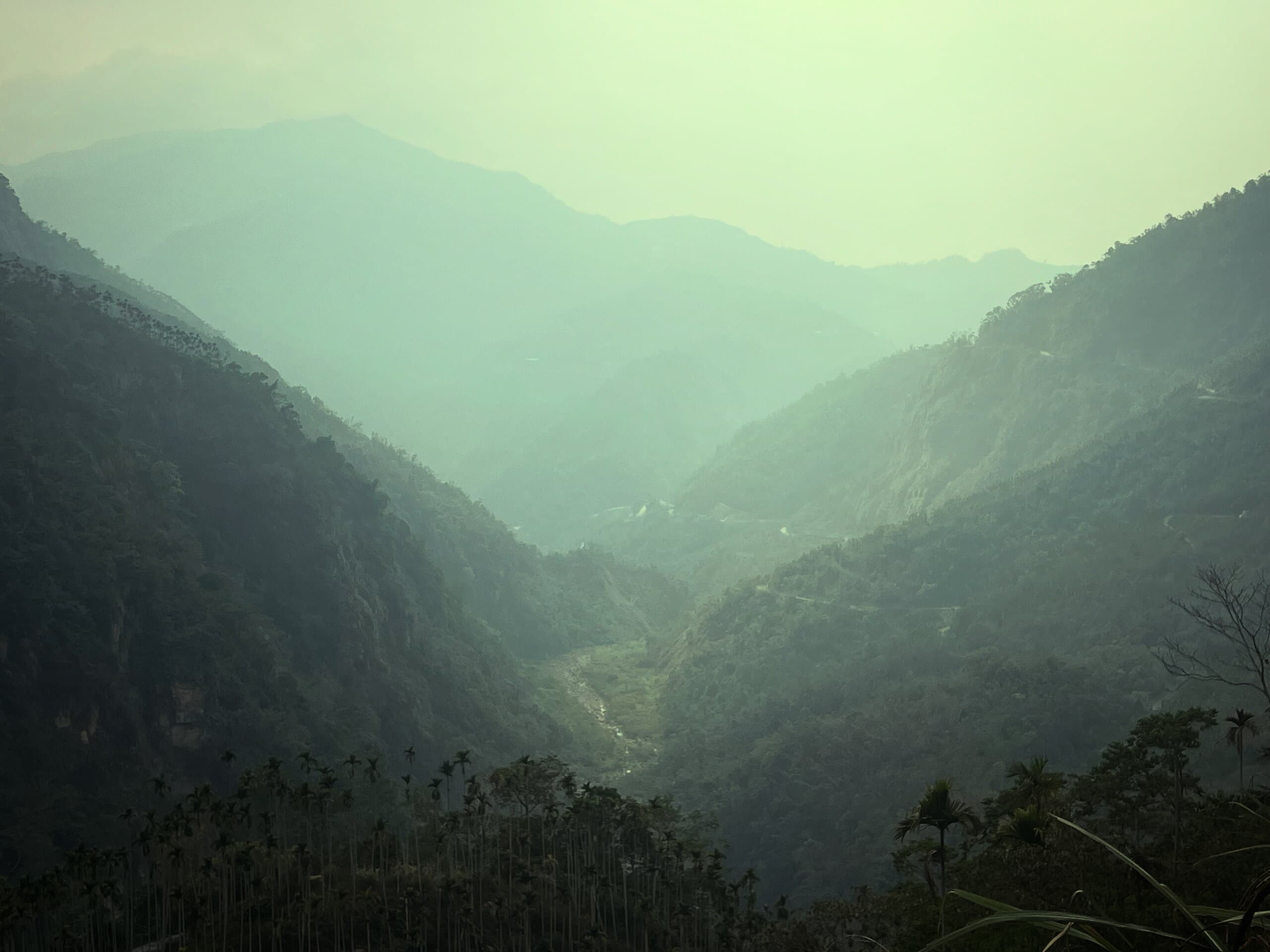 Alishan — sea of clouds at dawn above Shizhuo village